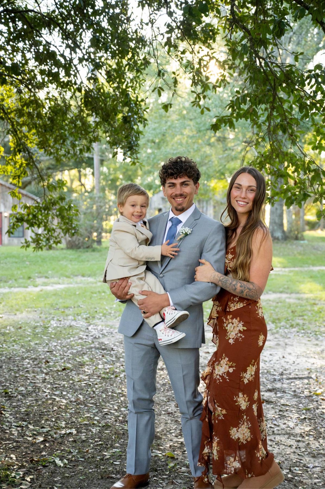 Nicholas Rains with his son Kai and wife Samantha